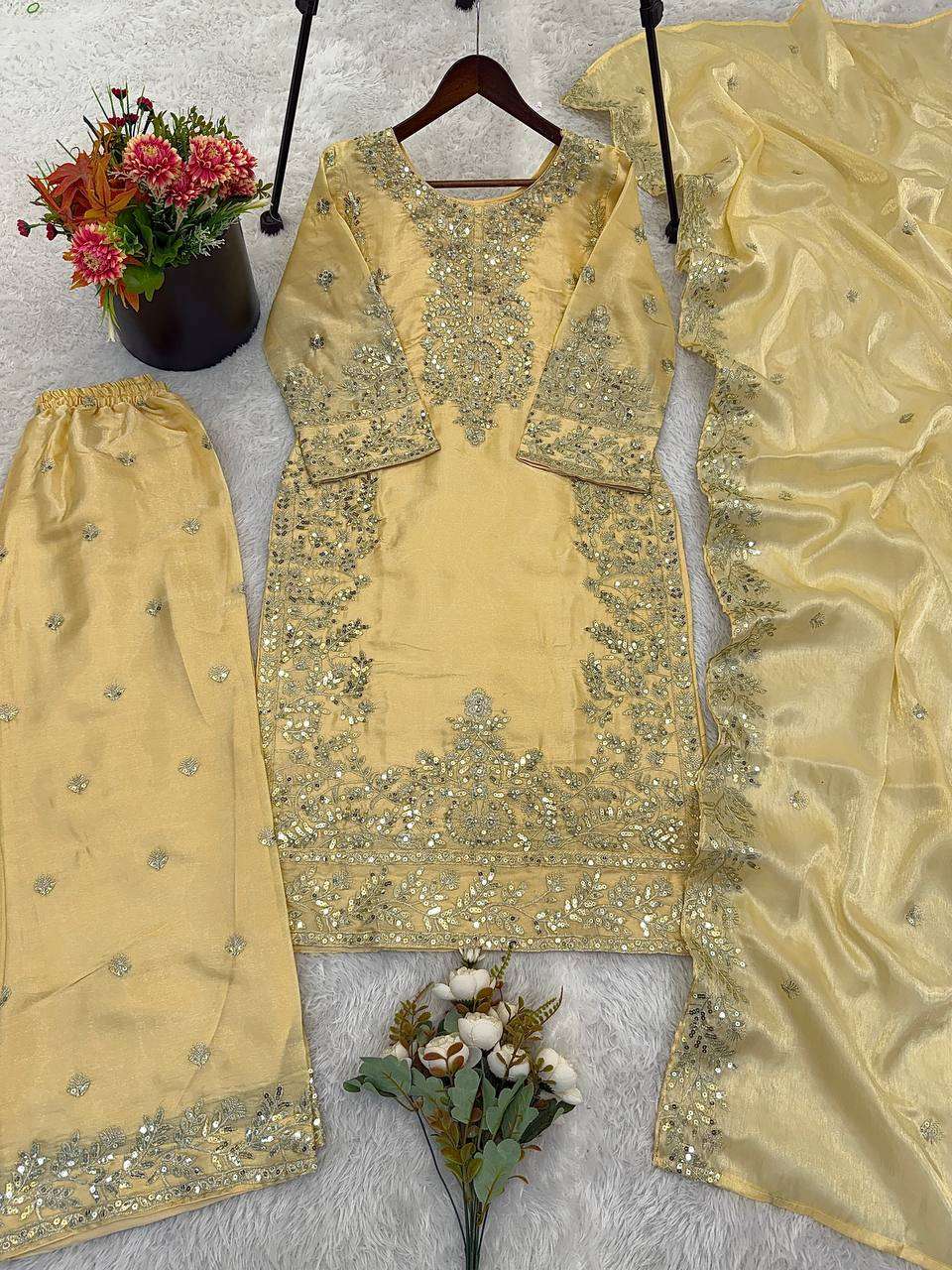 Graceful Yellow GMY Silk Top Plazzo Suit with Heavy Sequence Work