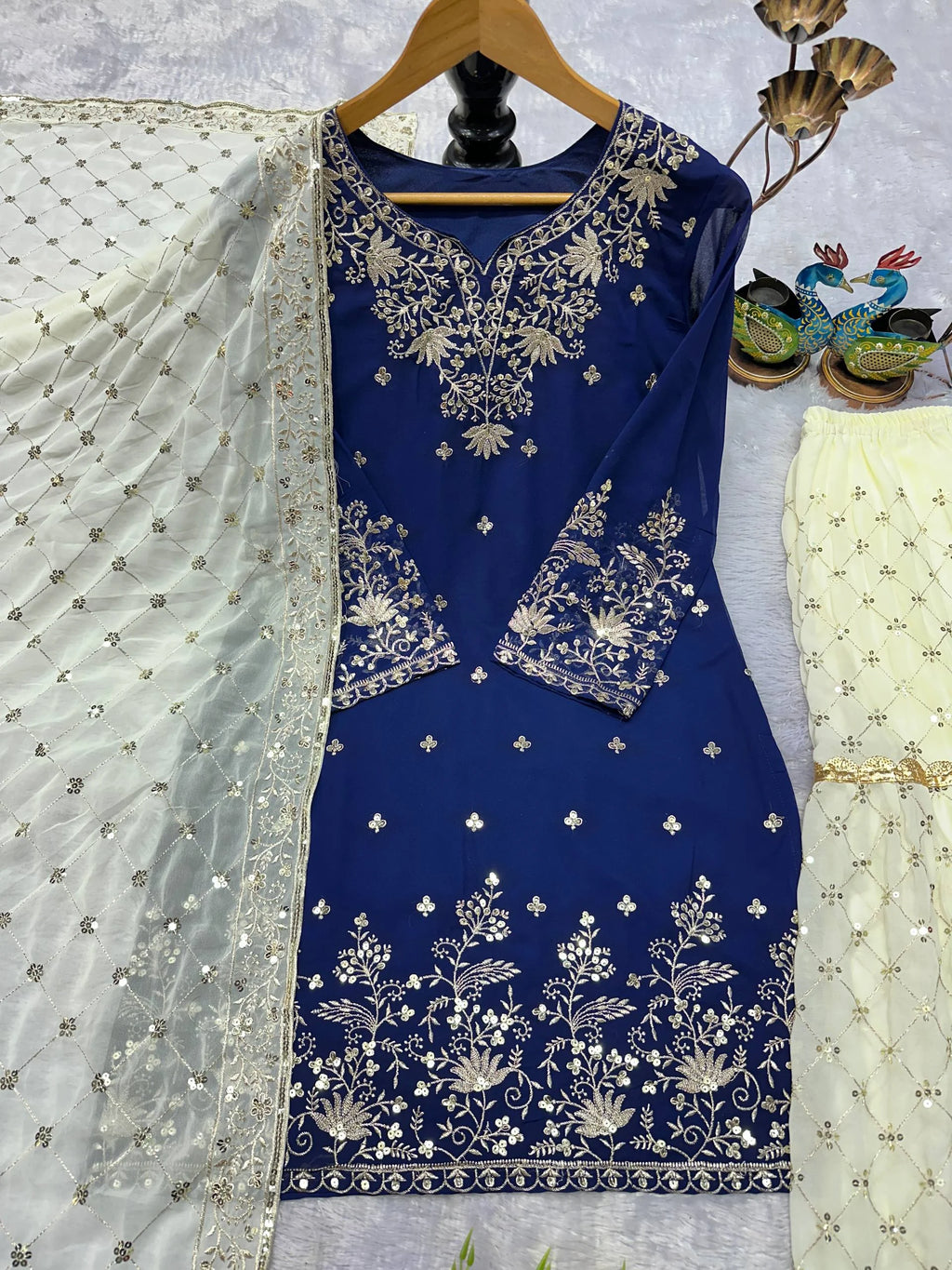 Graceful Blue Georgette Sharara and Top with Rich Lace Work Dupatta