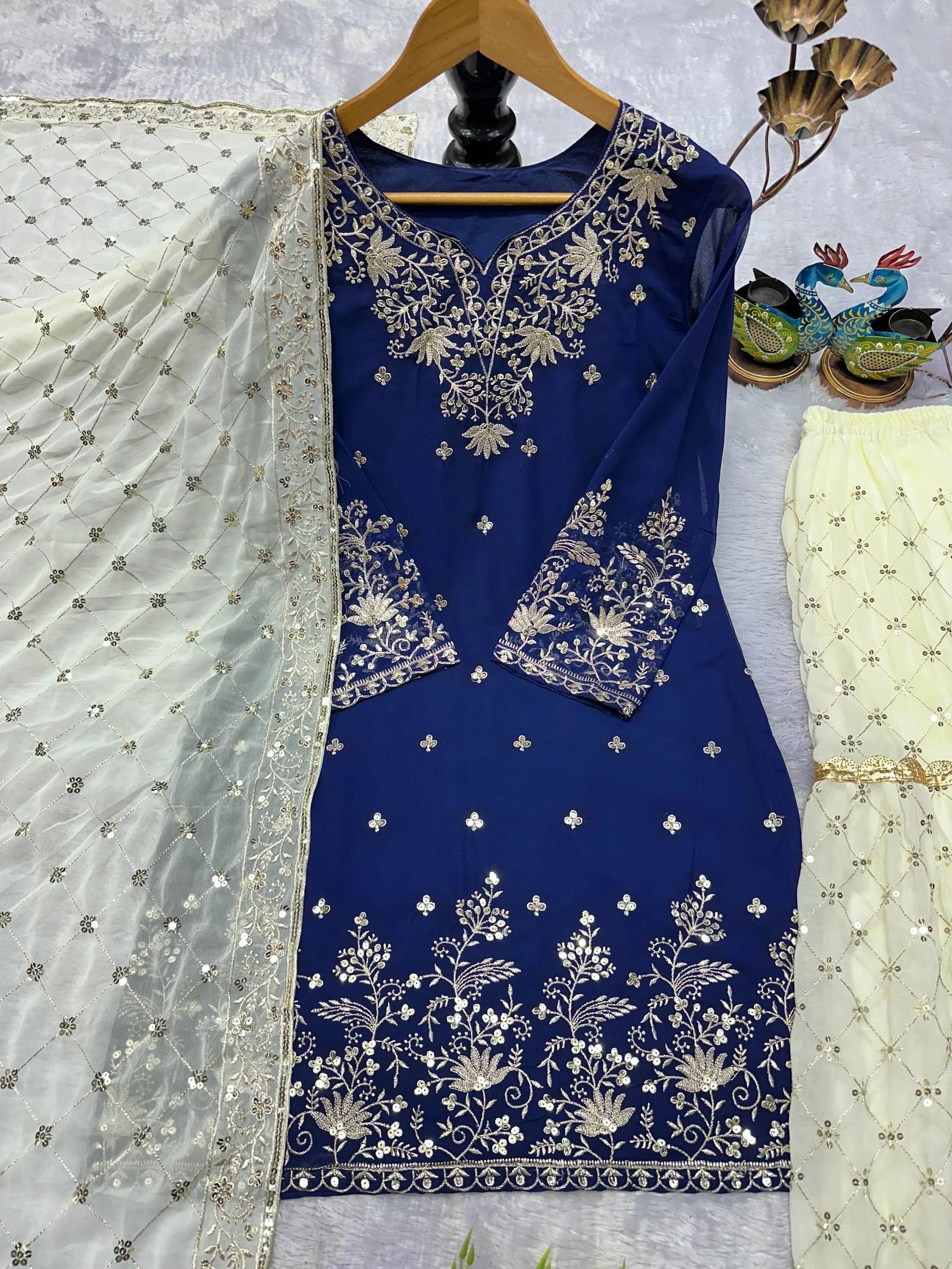 Graceful Blue Georgette Sharara and Top with Rich Lace Work Dupatta