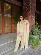 Pastel Yellow Silk Palazzo Suit with Fancy Tassels & Embroidery â€“ Eid Special