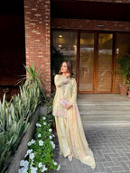 Pastel Yellow Silk Palazzo Suit with Fancy Tassels & Embroidery â€“ Eid Special