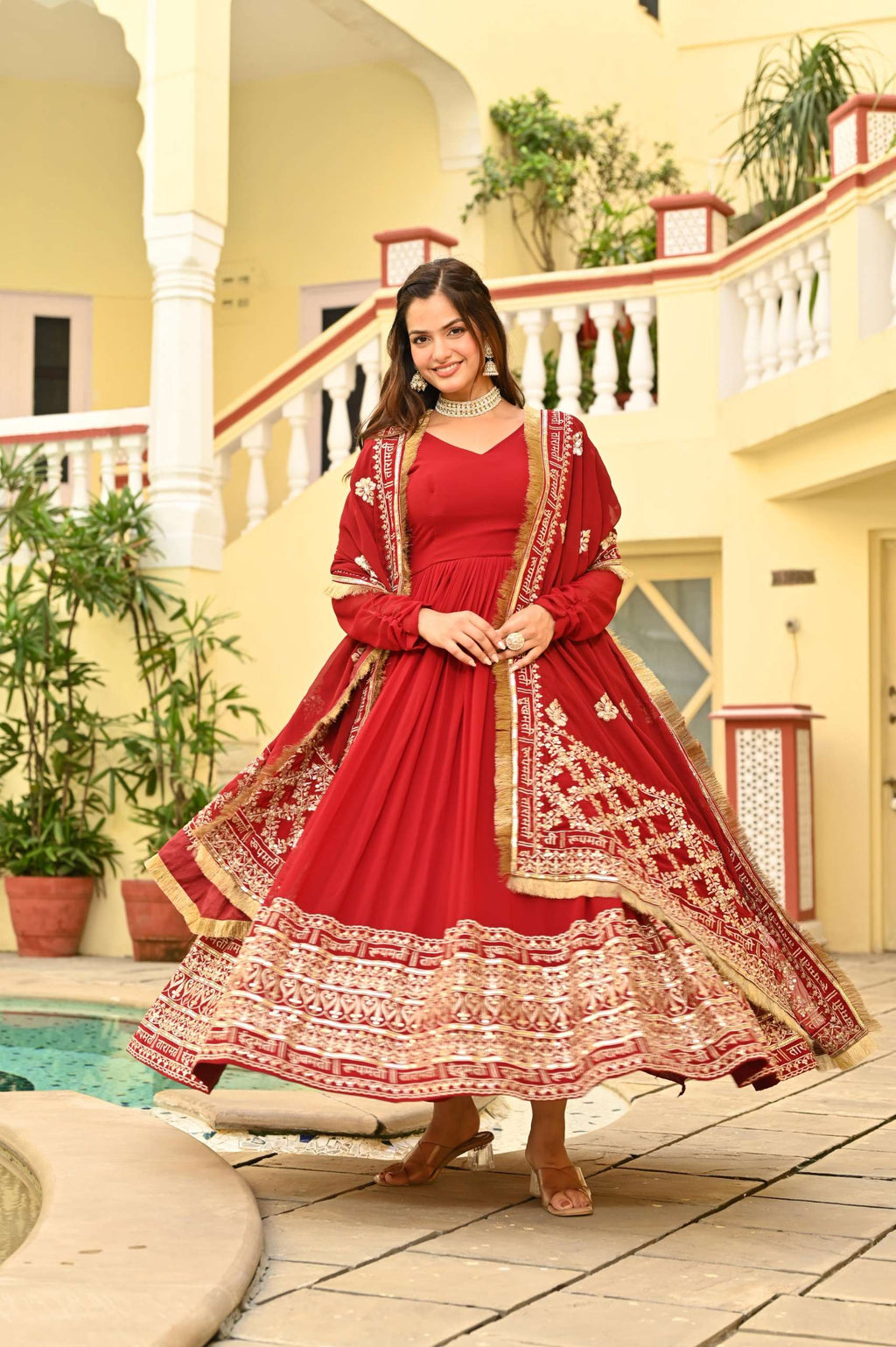 Designer Red Embroidered Gown â€“ Faux Blooming Fabric with Zari & Sequence Detailing