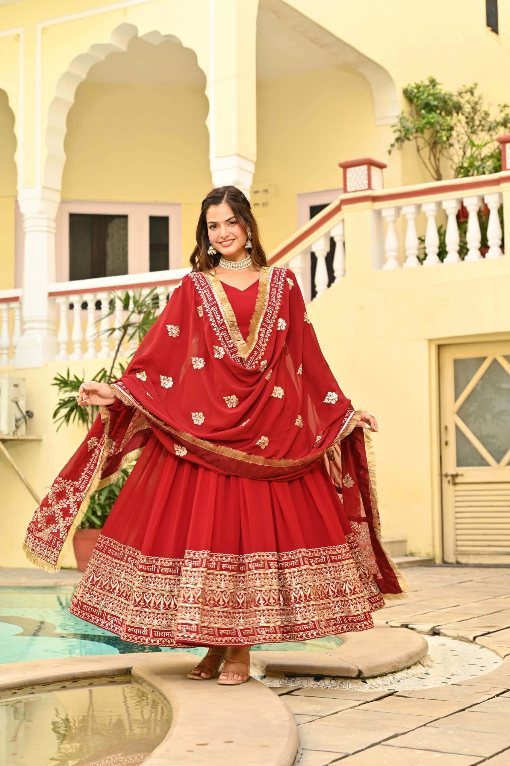 Designer Red Embroidered Gown â€“ Faux Blooming Fabric with Zari & Sequence Detailing