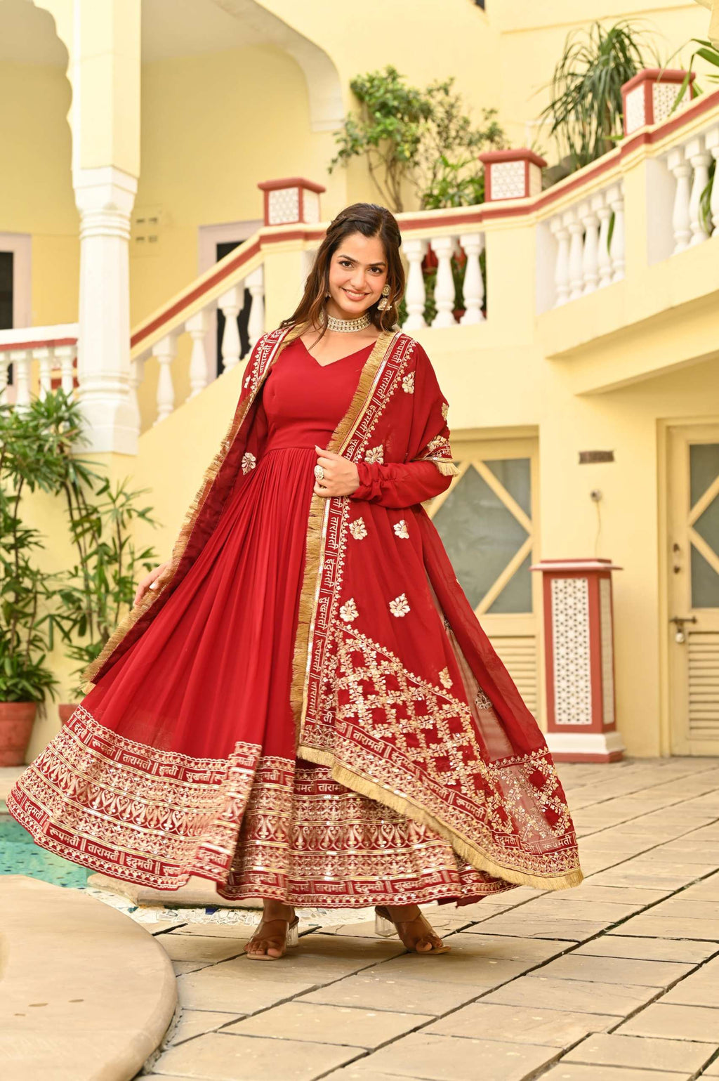 Designer Red Embroidered Gown â€“ Faux Blooming Fabric with Zari & Sequence Detailing
