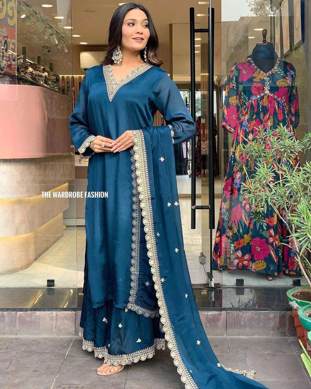 Add a touch of grace to your wardrobe with blue Roman satin outfit