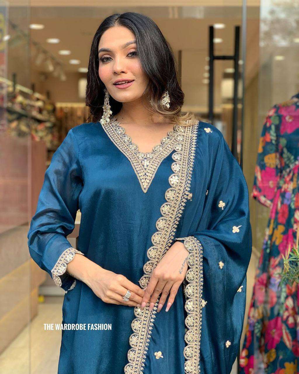 Add a touch of grace to your wardrobe with blue Roman satin outfit
