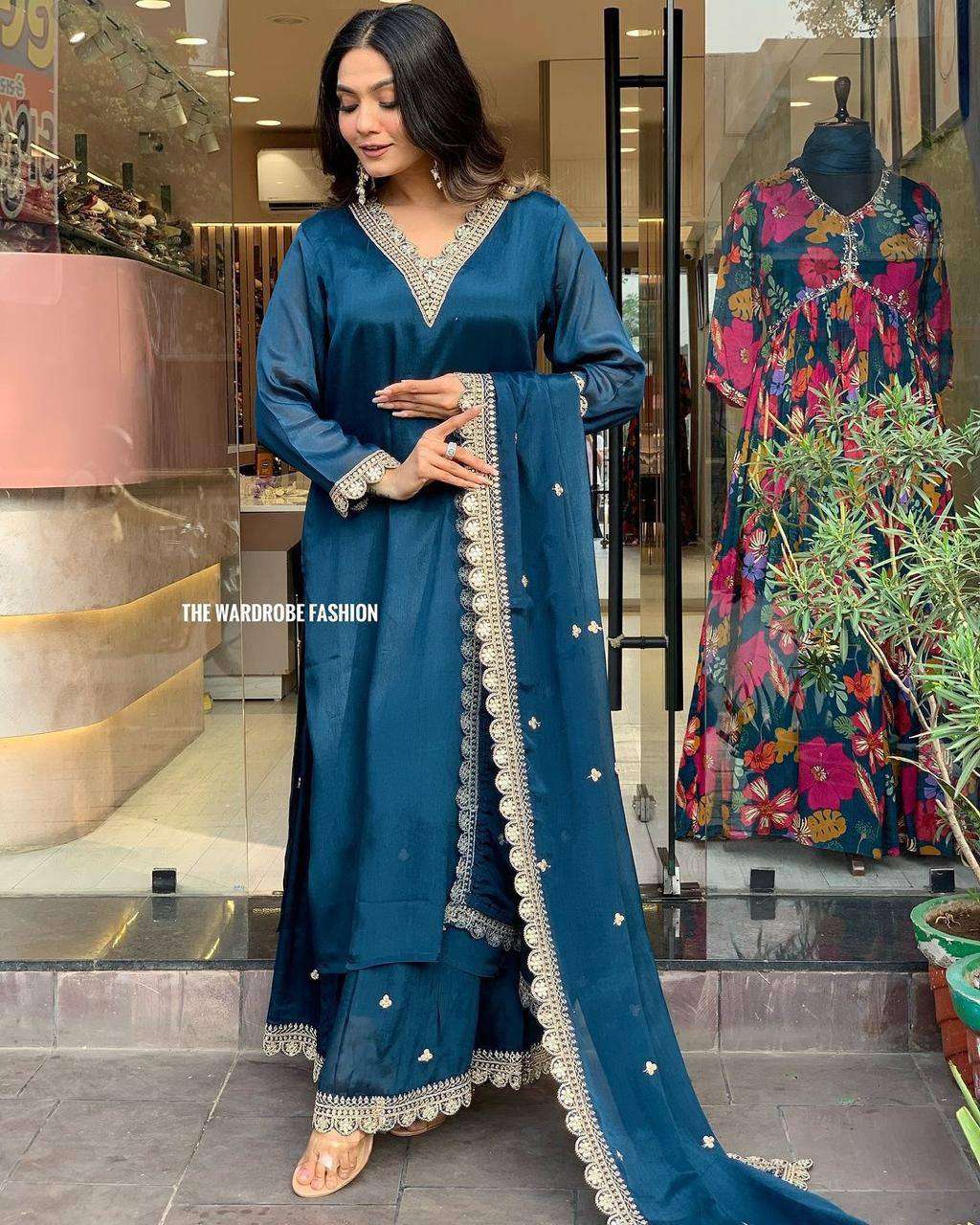 Add a touch of grace to your wardrobe with blue Roman satin outfit
