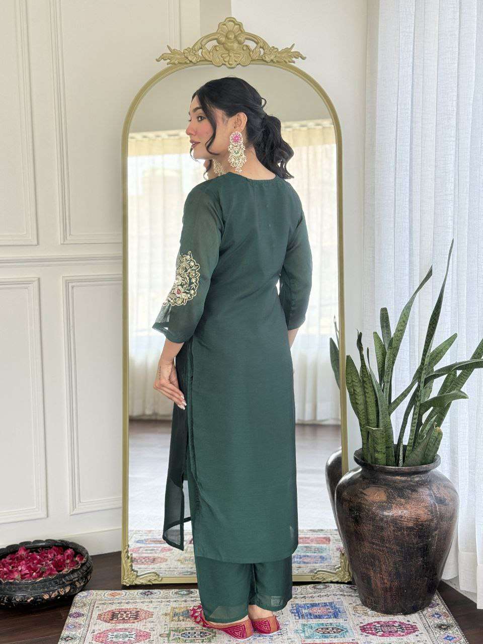 Bottle green glam with a vibrant rani pink dupatta touch