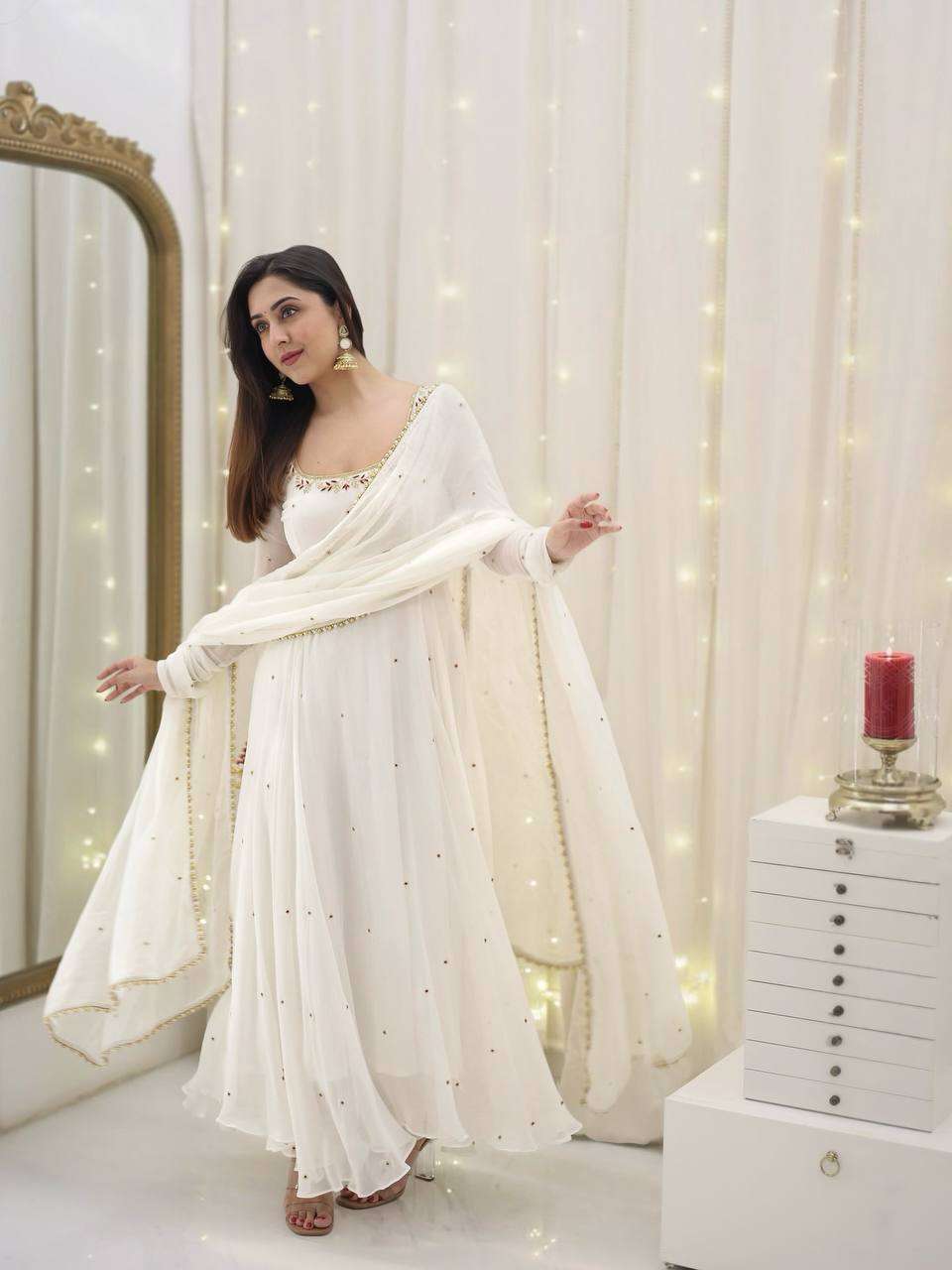 Glamour redefined — sequin-embroidered gown with dupatta