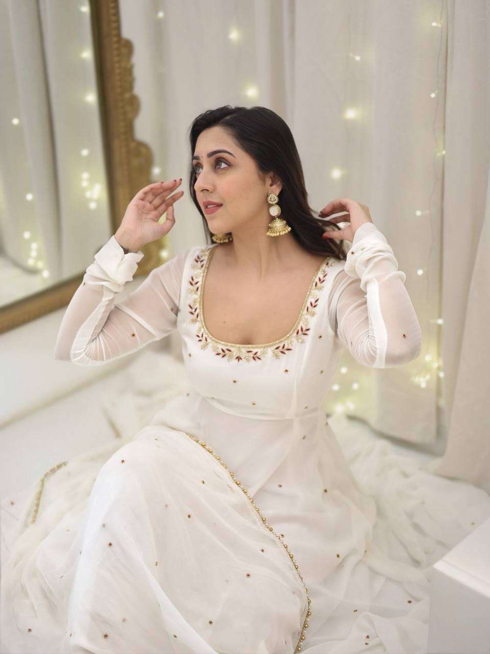 Glamour redefined — sequin-embroidered gown with dupatta