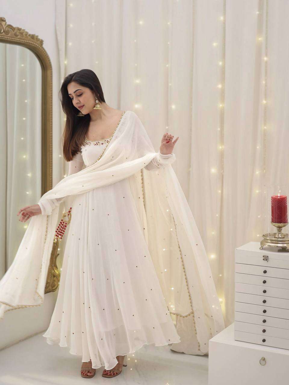 Glamour redefined — sequin-embroidered gown with dupatta