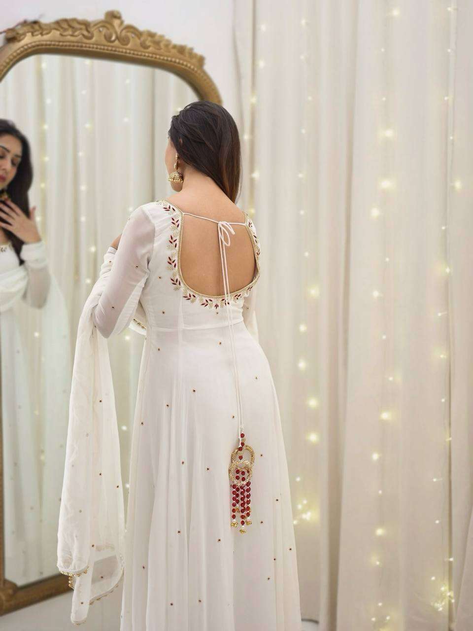 Glamour redefined — sequin-embroidered gown with dupatta