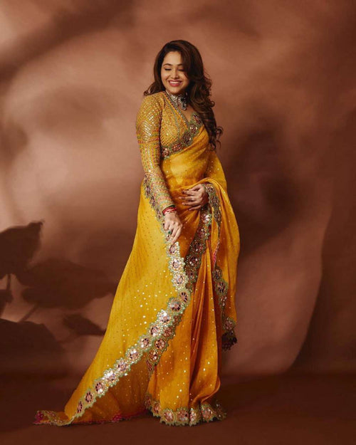 A saree that speaks sequins, coding, and elegance