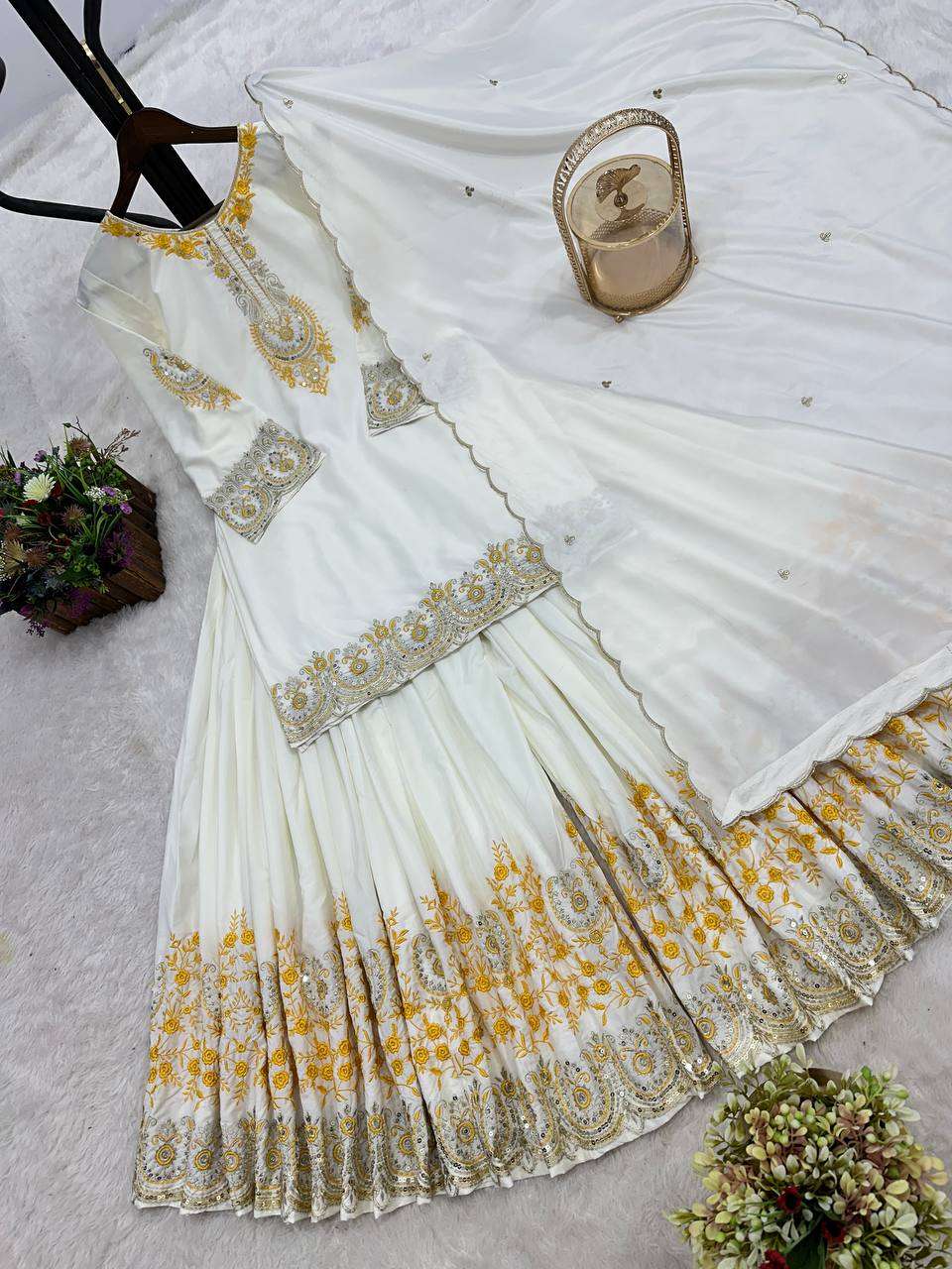 Luxury meets comfort—natural French crepe paired with golden thread magic