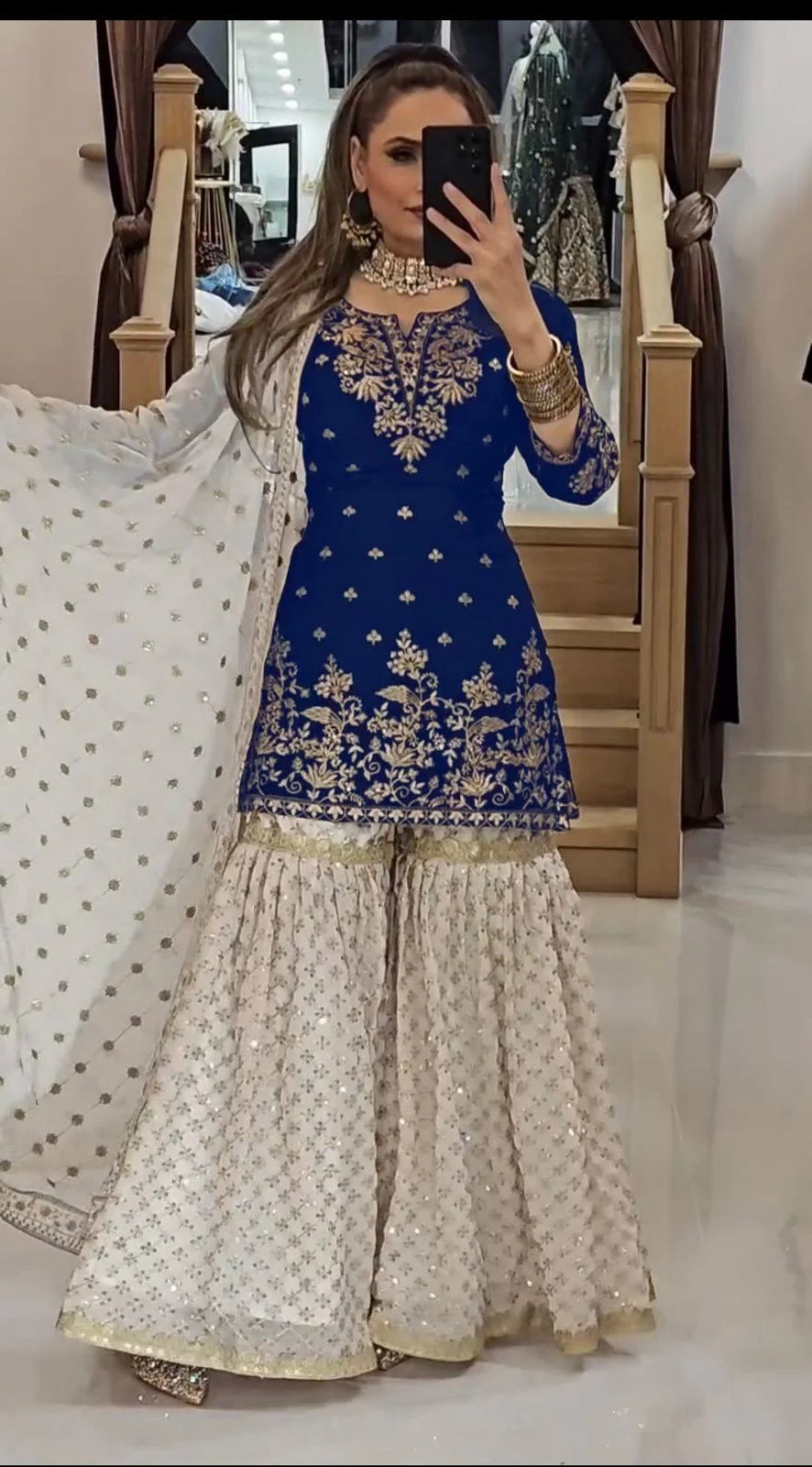 Graceful Blue Georgette Sharara and Top with Rich Lace Work Dupatta