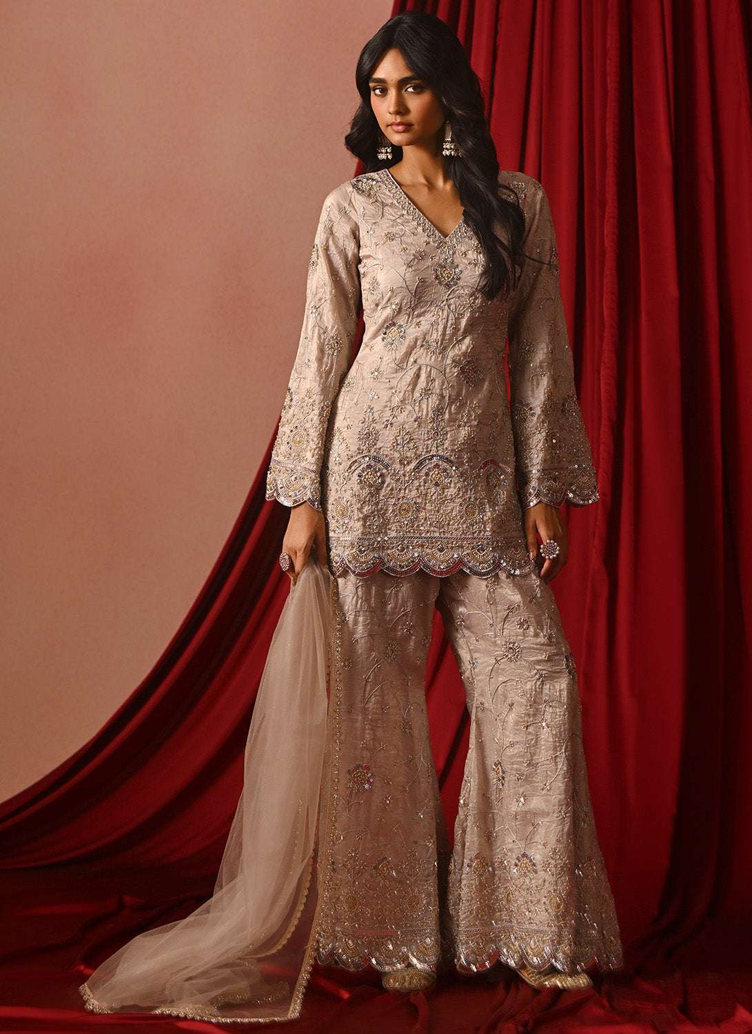Light Nude Pink Silk Embroidered Sharara Suit with Net Dupatta
